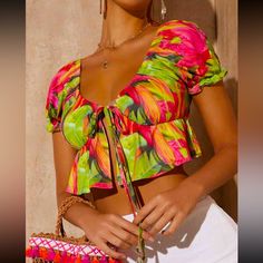 Nwt!!! Shein Green/Pink Tropical Print Tie Front Ruffle Crop Top, Size Small (4). Great Beautiful Summer Top! Great For Vacay, Festivals, Or A Nice Relaxing Day At The Beach - Bust: 33.1” - Length: 17.3” - Sleeve: 8.7” - Bicep: 17.7” - 91% Polyester - 9% Elastane - Machine Wash - Do Not Dry Clean - Wash With The Softest Detergent Offers Welcome Comes From A Smoke Free Home Flirty Green Summer Tops, Chic Pink Tropical Print Top, Chic Pink Tops With Tropical Print, Chic Pink Top With Tropical Print, Pink Tropical Top For Spring, Pink Tropical Print Top For Spring, Tropical Spring Tops, Fitted Tropical Tops For Spring, Flirty Pink Beach Tops