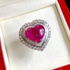 BRAND-NEW!! ONE OF A KIND, HANDCRAFTED RING. ENORMOUS & ELEGANT, 13.59 total carats weight, Certified, GORGEOUS, BURMESE RED RUBY ring. This ring offers an important statement of who you are with a GIGANTIC 10.82 carats, VIVID RED, Nearly TRANSPARENT, BURMESE RUBY. Accentuating the RUBY are the 82 E/VVS, and sparkling natural diamonds THE ITEM YOU SEE IN THE PICTURES IS THE EXACT ITEM YOU WILL GET! ONE OF A KIND, NO DUPLICATES OR TWINS SUGGESTED RETAIL VALUE: $32,500 RUBY: Weight: 10.82 cara Oval Ruby Ring In Platinum, Oval Ruby Ring In Platinum For Gift, Gia Certified Heart Diamond Rings, Gia Certified Heart Shaped Fine Jewelry Ring, Platinum Heart-shaped Fine Jewelry Rings, Fine Jewelry Platinum Heart-shaped Rings, Fine Jewelry Platinum Heart Rings, Heart-shaped Gia Certified Ring For Anniversary, Fine Jewelry Heart-shaped Platinum Rings