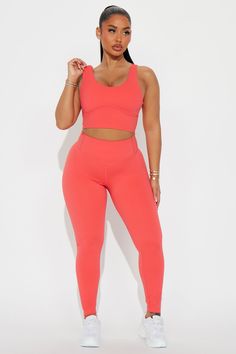 Available In Taupe And Orange. Sports Bra Sleeveless Scoop Neck Padded Under Bust Piping Ribbed Knit Back Low Impact 75% Nylon 25% Spandex Imported | Angela Sports Bra in Orange size XS by Fashion Nova Search By Photo, Orange Fashion, Jeans Jumpsuit, Swim Bottoms, Matching Dresses, Piping, Clothes For Sale, Dresses For Sale, Fashion Nova