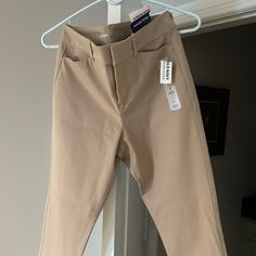 Size 6. Never Worn Great Condition. Tan Slacks/Pants High Waist Fitted Chinos For Workwear, High Waist Fitted Chinos For Business Casual, High-waisted Fitted Chinos For Work, Fitted High Waist Chinos For Work, Non-stretch Chinos With Pockets For Work, Non-stretch Workwear Chinos, Spring Non-stretch Chinos For Workwear, Non-stretch Spring Chinos For Workwear, Spring Workwear Non-stretch Chinos