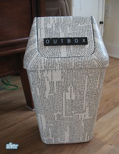 a box that has the word outbox written on it in black and white letters