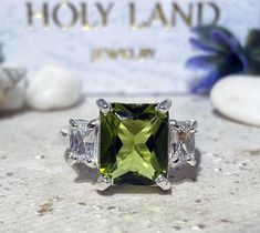 Don't miss this opportunity to own this beautiful gemstone ring crafted in 14k gold filled => Gemstone Type - Peridot, Clear Quartz => Gemstone Cut - Faceted => Gemstone Size - 8*10 mm, 3*5 mm => Total Number of Gemstones - 3 => Metal Type - 14k Gold Filled (Tarnish Resistant And Nickel Free) - also available in 925 sterling silver * Please contact me for pricing on a sizes larger than 11 * ~ Feel free to ask me about custom made designs. ❏ Replacements and custom orders : ✪ 925 s Green Rectangular Stone Ring, Peridot Three Stone Jewelry As Gift, Three Stone Peridot Jewelry As Gift, Rectangular Three Stone Jewelry Gift, Rectangular Three Stone Jewelry As A Gift, Three Stone Rectangular Jewelry Gift, Three Stone Radiant Cut Ring For Gift, Radiant Cut Three Stone Ring As A Gift, Radiant Cut Three Stone Ring Gift