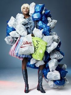 a woman in a dress made out of plastic bags