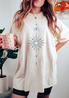 White Bohemian Cotton T-shirt, White Bohemian Relaxed Fit Shirt, White Bohemian Crew Neck Shirt, White Bohemian Shirt With Crew Neck, Bohemian Shirt With Relaxed Fit And Crew Neck, White Bohemian Top With Screen Print, Bohemian White Shirt With Graphic Print, White Bohemian Shirt With Graphic Print, Moon Sun And Stars