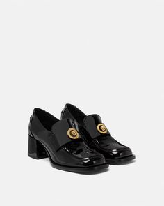 Versace Alia Patent Loafer Pumps | VERSACE Modern Luxury Loafers With Branded Heel Counter, Office Patent Leather Loafers With Buckle Closure, Chic Patent Leather Loafers With Sculpted Heel, Classic Patent Leather Loafers With Block Heel, Elegant Patent Leather Loafers With Buckle Closure, Patent Leather Block Heel Loafers For Office, Luxury Loafers With Block Heel For Work, Block Heel Patent Leather Loafers For Office, Luxury Block Heel Loafers For Work