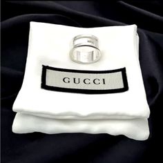 Add A Touch Of Vintage Gucci To Your Collection With This Cut-Out "G" Initial Stamped Silver Ring. Made In Italy From 925 Sterling Silver, This Band Style Ring Is Perfect For Everyday Wear. The Ring Size Is 6.75 And It Has An Msrp Of $395.00 This Gucci Ring Features The Iconic "G" Initial Stamp And Is Perfect For Those Who Love Fine Jewelry. The Metal Purity Is 925 And The Style Is A Band. There Is No Main Stone On The Ring. Buy This Brand New Vintage Piece Now And Add A Timeless Touch To Your W G Initial, Gucci Ring, Gucci Rings, Jewelry Bag, Box Jewelry, Jewelry Bags, New Vintage, Vintage Gucci, Silver Ring