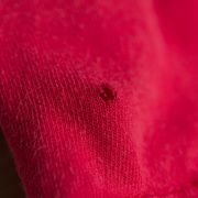 a close up view of a pink shirt