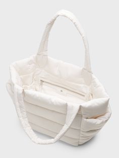 Puffer Tote Bag | Banana Republic Sporty Quilted Bag For On-the-go, Sporty Everyday Quilted Bags, Weekend Nylon Bag With Zipper Closure, Nylon Tote Diaper Bag With Zipper Pocket, Nylon Diaper Bag Tote With Zipper Pocket, Nylon Diaper Bag With Zipper Pocket, Tote Style, Practical White Nylon Bags, Weekend Nylon Tote Shoulder Bag, Nylon Tote Shoulder Bag For Weekend