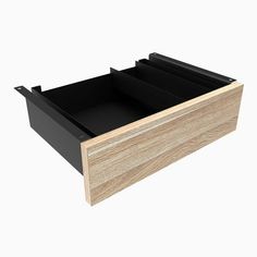 an open drawer with two drawers on the bottom and one drawer in the middle that is black