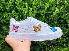 Please make sure you select the right size because I can not give refunds related to size once you receive the shoe Painted blue, orange, and pink butterflies with leather paint (NOT stickers) Finished coat of acrylic finisher - waterproof and durable Painted Nikes, Unique Butterfly, Air Force 1s, Color Butterfly, Nike Fashion Shoes, Custom Air Force 1, Colorful Butterfly, Leather Paint, Green Butterfly