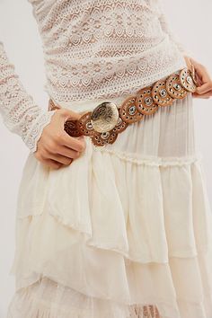 It’s all in the details with this Western-inspired belt, featuring round leather segments, stud details, and a coin buckle for a unique touch. **Features:** Circular segments, leather fabrication, stud details, adjustable fit, coin buckle, punch closure **Why We | Follow Your Arrow Belt by Free People in Brown, Size: S/M Follow Your Arrow, Boho Belts, Western Accessories, Free People Accessories, Western Look, Suede Belt, Western Boho, Round Leather, Belts For Women