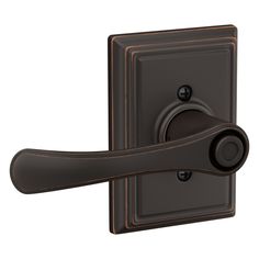 an image of a door handle on a black and brown wall mounted light switch box