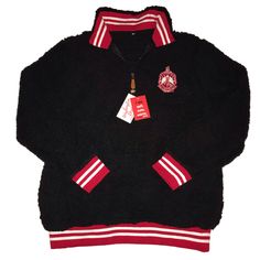 ****PRE-ORDER - Begins Shipping 3/15/2022 Delta Sigma Theta DST Crested Sherpa Pullover 100% Polyester, super soft black Sherpa, Sizes S-3XL, Red/White/Black, side pockets, leather zipper Pull tab. Designed exclusively for Delta Sigma Theta by Washington Designs. Limited quantities available. Fits true to size. Please check size chart below before ordering. Orders will begin shipping 3/15/2022 Please check size chart before ordering. No returns or exchanges will be accepted. No exceptions. Front Yard Plank Delta Sigma Theta, Greek Paraphernalia, Sorority Ideas, Delta Girl, Theta Sorority, Delta Sigma Theta Sorority, Vegan Leather Backpack, Delta Sigma Theta, Sherpa Pullover