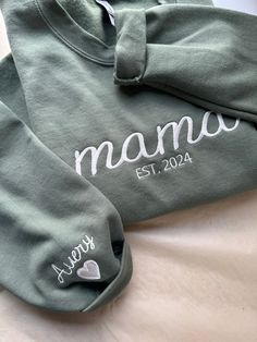 THIS WILL BE EMBROIDERY ON THE SWEATSHIRT ♥TO ORDER♥ ADD YOUR PERSONALIZATION BELOW Customize this shirt with mama, meme, nana etc.. Add your Est date and then add the kids name on the sleeve (heart will also be on the sleeve as shown below.) Just list them in the personalization area when ordering. Select your Sweatshirt Color from the chart Dark Colored shirts will have Ivory or White Thread Light Color Shirts will have Black or Gray Thread Please make sure to add a phone number and email at c Meme Nana, Mama Meme, Embroidered Sweatshirt, Embroidered Sweatshirts, Kid Names, The Kids, Baby Stuff