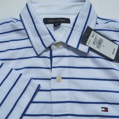 Tommy Hilfiger Sport Polo Men's Short Sleeve Polo Shirt Msrp: $49.99 100% Authentic Brand New Wit Tags Sizes: Xlarge / Xl Pictures Show The Exact Item You Are Getting In Size Medium Color: White And Blue Features: Men's Short Sleeve Polo Shirt Classic Fit 100% Cotton Light-Weight Material Machine Washable Front Button Closure Mini Flag On The Chest Measurements Laying Flat (Approximately): Size Xlarge: Chest, Arm Pit To Arm Pit: 22 3/4inch; Length: 30 Inch. Classic Tommy Hilfiger Striped Tops, Casual White Tommy Hilfiger Shirt, Tommy Hilfiger White Summer Shirt, Tommy Hilfiger Polo Shirt Men, Mini Flag, Yellow Polo Shirt, Tommy Hilfiger Polo Shirt, Tommy Hilfiger Long Sleeve, Green Polo Shirts