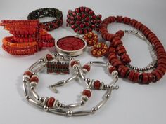 Vintage Red Jewelry 8 piece lot.  Silver findings, no markings.  Coral Ring, Coral Necklace, Stretch Bracelet, Pendant enhancer, coral bracelet, clip on earrings, long Silver and coral necklace, multi strand bracelet.  Came from elderly ladies estate in Colorado.  See pictures for more details. Actual items are pictured. Hand-strung Red Coral Jewelry As A Gift, Hand-strung Red Coral Jewelry For Gifts, Gift Jewelry With Hand-strung Red Coral, Hand-strung Red Coral Jewelry Gift, Elegant Red Hand-strung Jewelry, Red Coral Round Beads For Jewelry Making, Hand-strung Red Coral Jewelry, Hand-strung Red Coral Jewelry In Coral Color, Formal Vintage Red Coral Jewelry