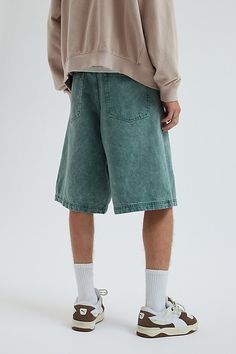 Oversized BDG baggy jorts in premium BDG denim. Longline denim shorts with a relaxed fit and zip fly. Urban Outfitters exclusive. Features BDG Astro baggy denim jorts Longline denim shorts Mid rise waist Rigid BDG denim Loose longline fit 5-pocket; zip fly UO exclusive Content + Care 100% Cotton Machine wash Imported Size + Fit Model in Dark Green 6'1.5" and wearing size 32 Measurements taken from size 32 Rise: 14" Inseam: 11.5" Leg opening: 12.5" | BDG Astro Denim Jort in Chartreuse, Men's at U Denim Jorts, Baggy Denim, Men's Shoes Accessories, Women Men Shoes, Baggy Jeans, Mens Bottom, Exclusive Collection, Mens Shorts, Dark Green