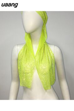 a mannequin wearing a neon yellow scarf