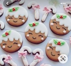 decorated cookies are arranged on a table