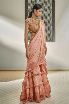 Pink pre-draped saree with floral crochet lace, loop rope detailing and badla embroidery.
Components: 1
Pattern: Hand Embroidery, Crochet
Type Of Work: Floral, Badla, Rope
Fabric: Chanderi
Color: Pink
Other Details: 
Golden pipe embellished pallu border
Hand embroidered loop rope detailing
Note: Blouse worn by the model is not for sale
Occasion: Sangeet,Reception - Aza Fashions Festive Pre-draped Saree With Lace Work For Designer Wear, Festive Pre-draped Georgette Saree With Lace Work, Festive Pre-draped Saree With Lace Work, Designer Pre-draped Saree With Intricate Embroidery, Traditional Designer Pre-draped Saree With Lace Work, Pre-draped Saree With Intricate Embroidery For Reception, Bohemian Pre-draped Saree With Resham Embroidery, Bollywood Style Georgette Pre-draped Saree With Lace Work, Georgette Pre-draped Saree With Lace Work