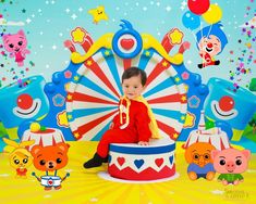 a baby sitting on top of a carnival ride surrounded by balloons and stars in the sky