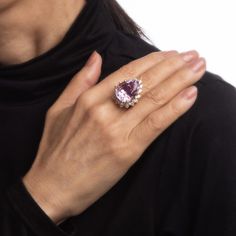 This is part of Chairish’s Fine Jewelry assortment.  Stylish vintage Kurt Wayne kunzite & diamond ring (circa 1980s) crafted in 14 karat yellow gold.   Faceted pear cut kunzite measures 20mm x 15mm (estimated at 18.50 carats). 32 diamonds range in size from 0.05 to 0.12 carats. The total diamond weight is estimated at 2.72 carats (estimated at G-H colour and VS2-SI1 clarity). The kunzite is in very good condition and free of cracks or crisps.    The light pink kunzite is securely set into the pe Kunzite Ring, Diamond Ring Vintage, Gold Cocktail, Late 20th Century, Ring Vintage, Vintage Rings, Sapphire Ring, 20th Century, Light Pink