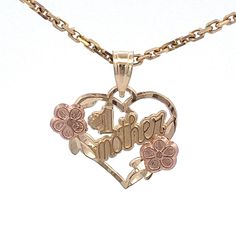 "14k Yellow Gold #1 Mother Heart Pendant /Charm with Rose Gold Flowers - Vintage ~  ET1540 Metal Content: Solid 14K Gold Chain is NOT included Pendant Measurements Length including bail:  3/4\" (19mm) Width:  11/16\" (17mm) Bail opening: 4mm x 3mm Weight: 1.0 Grams Stamps: ZED 14k Condition:  New  Each piece is thoroughly examined and refinished as needed by our professional jewelers, tested to guarantee metal content,  graded by our in-house GIA (Gemological Institute of America) Graduate Gemologist, and inspected for quality before being carefully packaged and promptly shipped. Thank you for taking the time to shop with us! We have hundreds of more listings, with more being added every week! From necklaces to bracelets, the classics and trendy.  We are likely to have something you and yo Heart-shaped Jewelry For Mother's Day, Mother's Day Heart Pendant Jewelry With Rose Design, Mother's Day Heart Pendant With Rose Design, Mother's Day Rose Design Jewelry For Anniversary, Pink Gold Jewelry For Anniversary And Mother's Day, Pink Gold Jewelry For Mother's Day Anniversary, Stamped 14k Rose Gold Necklace For Mother's Day, Rose Gold Jewelry With Hallmarks For Mother's Day, 14k Stamped Rose Gold Jewelry For Valentine's Day