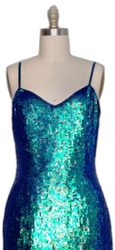 Fitted Embellished Mermaid Evening Dress, Sequin Mermaid Dress For Prom, Mermaid Dress With Sequins For Party Season, Sequin Mermaid Dress For Party Season, Prom Season Mermaid Sequin Dress, Glamorous Blue Sequin Mermaid Dress, Glamorous Sequin Dress With Mermaid Hem, Blue Embellished Mermaid Dress, Fitted Mermaid Dress With Sequins