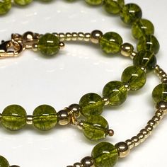 Peridot, peridot, olivine. A self-contained gem. Stone of change. Bracelets in different versions, transformable earrings with pendants. Elegant Peridot Jewelry With Natural Stones, Green Bracelet With Lobster Clasp, Green Faceted Bracelet, Green Faceted Spiritual Jewelry, Spiritual Green Faceted Jewelry, Green Peridot Gemstone Beads Jewelry, Green Peridot Jewelry With Gemstone Beads, Peridot Faceted Jewelry For May Birthstone, Faceted Peridot Jewelry For May Birthstone