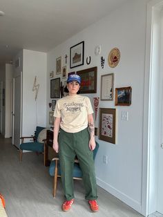 "90s military fatigue green pants  no tag size  Rise: 12\" Flat across: 19\" Inseam: 28\"  Thigh flat: 14\" hips: 23\" Boho, retro, 60s, 70s, 80s, and 90s vibes  Vintage items may have imperfections, if they are major or extremely visible they will be noted Smoke free home  No shedding pets Cleaned before mailing + urban outfitters  + free people + madewell  + vintage  Vintage items may/will probably have imperfections, if they are major or extremely visible they will be noted. Buying vintage items could mean they are different than what you had expected, but still just as lovely because they have lived a full life and have a story to tell!  We know that paying for shipping isn't ideal, but we are a small company and vintage items can be quiet heavy since they are made out of better materi Green Short Sleeve Turtleneck Outfit, 90s Green Wide Leg Pants, 90s Style Green Wide Leg Pants, 90s Style Green Wide-leg Pants, Green Cotton Work Pants For Fall, Vintage Cargo Pants For Spring Streetwear, Vintage Khaki Cargo Bottoms, Vintage Cargo Style Pants For Streetwear, 90s Style Green Cotton Bottoms