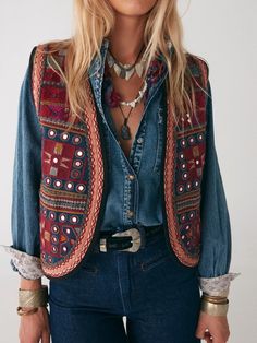 The Claudio Vest in Ooti Rock. Inspired by a vintage scarp from one of our travels to India, we worked long and hard to strike a balance and come up with the Claudio Vest. Cut in cotton canvas, the vest features a multi-tone embroidery with real mirrorwork and a contrast border. It pairs beautifully with our Astrid Mal Real 70s Outfits, Boho Vest Outfit, Marceline Fashion, Womens Boutique Clothing, Surfing Style, Look Winter, Clothes Art, Boho Vest, 70s Outfits