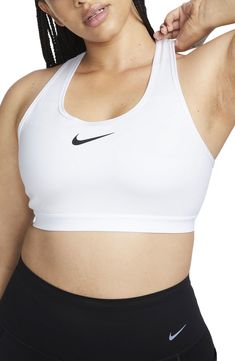 Feel supported in this racerback sports bra with sweat-wicking tech and an adjustable back that makes it easy to customize your fit. Racerback Dri-FIT moisture-wicking technology 72% polyester, 28% spandex with 65% nylon, 35% spandex contrast Machine wash, dry flat Imported White Sports Bra, Racerback Sports Bra, White White, Bra Lingerie, Nike Dri Fit, Dri Fit, Moisture Wicking, White Black, White And Black