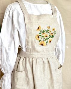 Every cook needs an apron This apron is designed for women as and special gift for your best friend, gift for mom, for sisters  ITEM DESCRIPTION ✔️ Classic linen apron, the one apron you will ever need in your kitchen or garden ✔️ Make from linen it will keep your clothes clean ✔️ unique and handmade  ✔️ We also design 2 pockets where you can keep little kitchen or gardening utensils on hand.  ✔️ Handmade 100% with hand-embroidered  ✔️Pattern: floral ✔️ Colour in the picture: Hunter green  Anoth Embroidery Aprons, Apron For Women, Embroidered Apron, Cute Aprons, Custom Aprons, Gardening Outfit, Aprons Patterns, Little Kitchen, Womens Aprons