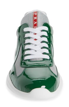 Modern mesh inlays add a touch of texture to a sporty sneaker formed from high-shine patent leather. Style Name:Prada Americas Cup Sneaker (Men). Style Number: 725998. Americas Cup, Sporty Sneakers, Sneaker Men, Leather Style, Patent Leather, Rubber Sole, Prada, Men's Shoes, Mango