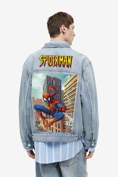 "Introducing our limited edition denim jacket, perfect for those who want to elevate their style game. Made from high-quality denim material, this jacket features a stylish print of \"Spiderman\" on the back. With its classic design and comfortable fit, it's perfect for any casual occasion. Plus, with limited stocks available, you'll be sure to stand out from the crowd. Don't miss out on this must-have addition to your wardrobe. Order now and ignite your look with Fuel." Spiderman Jean Jacket, Marvel Gifts, Demin Jacket, Denim Material, Jean Jacket, Order Now, Classic Design, Must Haves, Spiderman