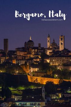 the city lights are lit up at night in berganoo, italy with text overlay