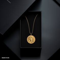 Elevate your faith and protection with our gold St Christopher pendant. This solid gold necklace showcases exquisite craftsmanship, symbolizing the patron Saint of travelers and Catholic devotion. More than just jewelry; it's a fine representation of faith and safeguarding. PENDANT INFORMATIONThis pendant is made of real, solid gold.• Made in USA• Material: 14k or 18k solid gold• Finish: polished• Height: 1.15" (29 mm) x Width: 1" (26 mm)• Pendant weight: approx. 8 grams (14k)• Bail: fits up to Nature Symbols, St Christopher Pendant, Lion Pendant, Divine Love, St Christopher, Solid Gold Necklace, Solid Gold Chains, White Gold Chains, Mini Pendants