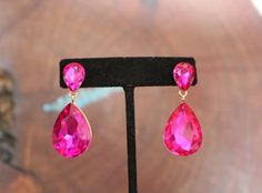 Rose Red Dangle Earrings For Party, Glamorous Pink Earrings For Gift, Rose Red Drop Earrings For Party, Elegant Rose Red Earrings For Party, Pink Teardrop Earrings For Party, Pink Teardrop Jewelry For Party, Pink Dangle Jewelry For Party, Glamorous Pink Teardrop Earrings, Purple Crystal Earrings For Party