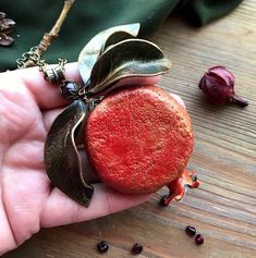 "This necklace already sold but I can make very similar (not 100% same) for your order. If you need longer chain please write it in comment to order) Statement juicy pomegranate pendant with leaves. Pomegranate seeds - natural garnet. skin and leaves - polymer clay. the bead at the top of the pendant is garnet. Garnet pomegranate ) Garnet - January birthstone Diameter of pomegranate 5cm (1.96\") Chain 48cm (19\")" Nature-inspired Gemstone Necklace For Gifts, Nature-inspired Gemstone Necklace For Gift, Red Nature-inspired Jewelry For Gifts, Handmade Red Nature-inspired Necklace, Red Natural Stones Nature-inspired Jewelry, Garnet Pendant Necklace For Gifting, Garnet Pendant Necklace Gift, Garnet Pendant Necklace For Gift, Artisan Red Necklace For Gift