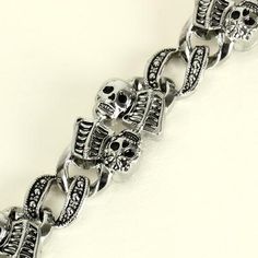 Ghastly Glam: Spook up your style with this grim glimmer of gothic grace. A vintage-inspired skeleton bracelet to die for, this macabre metallic memento mori makes a killer cryptic cuff for your creepy couture. Cast in antiqued silver and accented with a dastardly dark patina, this bony bauble is a hauntingly hip Halloween essential and morbidly marvelous statement piece. Material: Alloy Product specifications: bracelet length 20cm, width 1.5cm. Gothic Stainless Steel Skull Bracelets, Halloween Punk Skull Bracelets, Punk Style Engraved Metal Jewelry, Engraved Punk Style Metal Jewelry, Engraved Metal Punk Jewelry, Adjustable Silver Grunge Bracelet, Halloween Skull Bracelets With Skull Print, Gothic Skull Print Bracelets As Gift, Adjustable Gothic Bracelets With Skull Print