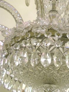 a crystal chandelier hanging from the ceiling