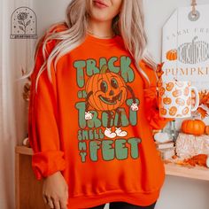 Retro Trick or Treat Halloween Pumpkin Sweatshirt Halloween Crewnecks Halloween Shirts Fall Shirts Fall Sweatshirt Funny Halloween Sweaters Distressed Graphic Tees ALL OF OUR ITEMS CAN BE MADE IN YOUTH SIZES, TSHIRTS (COMFORT COLORS AND BELLA CANVAS), SWEATSHIRTS AND HOODIES AND IN OTHER COLORS THAN LISTED USUALLY. IF THERE IS A DESIGN YOU WOULD LIKE IN A DIFFERENT OPTION JUST ASK AND WE WILL ADD IT FOR YOU PLEASE NOTE: These sweatshirts are unisex and fit true to size! If you prefer an oversize Funny Orange Tops For Fall, Funny Orange Top For Fall, Halloween Long Sleeve Relaxed Fit T-shirt, Oversized Long Sleeve Halloween T-shirt, Funny Fall Streetwear T-shirt, Oversized Long Sleeve T-shirt For Halloween, Funny T-shirt For Fall Streetwear, Funny Long Sleeve T-shirt For Fall, Orange Crew Neck Halloween Sweatshirt