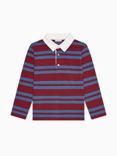 The Tijo Long Sleeve Boy Rugby Shirt has steadily become a staple in La Coqueta's collections, cut from responsibly sourced soft cotton jersey with a blue garment wash for a lived-in feel. Our idiosyncratic take on the classic rugby shirt has a vintage touch to it, complete with an appliquéd felt crest and the embroidered LC logo in contrasting thread for a collegiate, preppy look. It has long sleeves and dropped shoulders, with wide colour block stripes in light blue and burgundy red, a contrasting white collar, and a three-button fastening for a stylish and comfortable finish. Get the La Coqueta look this season and discover the wider range of boy’s clothing and shoes to elevate your little one’s everyday wear with versatile styles, and pair with La Coqueta's stretch cotton socks and tig Blue Organic Cotton Long Sleeve Tops, Blue Cotton Tops With Ribbed Collar, Blue Cotton Top With Ribbed Collar, Fall Blue Cotton Polo Shirt, Blue Relaxed Fit Top With Ribbed Collar, Blue Tops With Ribbed Collar And Relaxed Fit, Fall Cotton Crew Neck Polo Shirt, Cotton Long Sleeve T-shirt With Ribbed Collar, Cotton Long Sleeve Tops With Ribbed Collar