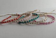 "These lovely bracelets are woven with natural hemp and accented with 25 glass seed beads. Pick your color in the drop down menu! Each bracelet is adjustable from 6\"-9\".  This listing is for one hemp bracelet.  *With all of my designs I strive for high quality and pay close attention to detail. *Great for casual occasions or going out, also great for a gift for your wife, sister, best friend, etc *Be kind to your hemp jewelry! Care instructions to ensure a longer lasting piece! - Remove your jewelry before sleeping.  - Do not bathe or swim while wearing, water will weaken the fibers and reduce durability. - Perfumes, essential oils, lotion and cleaning products will break down the hemp faster.  - Store in a cool dry place out of direct sunlight. *Feel free to contact me with any question Adjustable Macrame Beaded Bracelets For Friendship, Adjustable Macrame Beaded Friendship Bracelets, Casual Beaded Bracelet With Macrame And Round Beads, Casual Macrame Beaded Bracelet With Round Beads, Casual Beaded Bracelet With Macrame, Casual Macrame Beaded Bracelets, Casual Macrame Beaded Bracelets For Friendship, Casual Adjustable Beaded Braided Bracelets, Hemp Bracelet