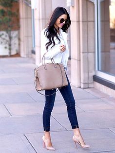 Shop this look on Lookastic: http://lookastic.com/women/looks/white-biker-jacket-beige-tote-bag-blue-skinny-jeans-beige-pumps/8332 — White Leather Biker Jacket — Beige Leather Tote Bag — Blue Skinny Jeans — Beige Leather Pumps Looks Chic, Moda Fashion, Look Fashion, Classy Outfits, Spring Outfits