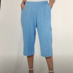 Nwt- Brightens Your Collection With These Comfy Capris From Alfred Dunner, Designed With A Classic Cropped Silhouette Comfortable Pull-On Styling, Go For A Casual Weekend Or Dress It Up With Heels For Work, Waist; 33”, Hips; 21” Flat, Inseam 18”, 65% Rayon, 35% Polyester. Summer Capri Bottoms With Pockets, Knee-length Bottoms With Side Pockets For Spring, Knee-length Capris With Pockets, Stretch Capris With Pockets For Summer, Spring Knee-length Pants With Pockets, Summer Stretch Capris With Pockets, Relaxed Fit Capris With Side Pockets, Spring Capris With Side Pockets And Cropped Leg, Capri Length Pants With Side Pockets