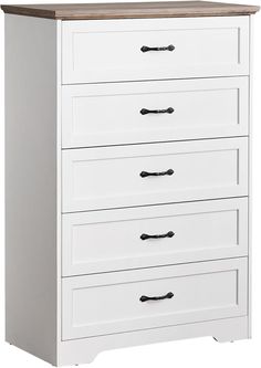 a white chest of drawers with wooden top