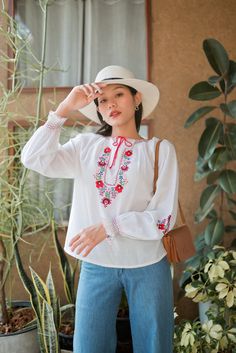 "Gorgeous vintage Hungarian floral embroidered blouse. The blouse features long sleeves with embroidered flowers. Made from soft cotton. Condition: In great vintage condition. Made in Switzerland Details and Measurements (Inch) size estimate: m *Measurements are taken in inches with the garment laying flat. BUST: 42 \" FULL LENGTH: 23 \" SLEEVE LENGTH: 26 \" from neck 18\" form armpits *If you are not sure about size please feel free to contact me I would be happy to help all questions and reque Long Sleeve Cotton Blouse With Embroidered Cuffs, Bohemian Cotton Blouse With Embroidered Cuffs, Fall Cotton Blouse With Embroidered Cuffs, Summer Long Sleeve Blouse With Embroidered Cuffs, Cotton Long Sleeve Blouse With Floral Embroidery, Long Sleeve Cotton Embroidered Top With Cuffs, Traditional Long Sleeve Blouse With Embroidered Cuffs, Cotton Embroidered Long Sleeve Top, Cotton Embroidered Cuff Long Sleeve Top