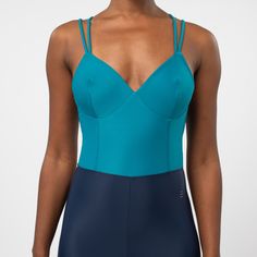 The Westbourne is an elegant one-piece defined by a low-cut neckline with double straps for support.  Tailored bodice with stitching to define waist and elongate the legs.  The Westbourne is both flattering and functional.  Great for workouts involving lots of movement. 78% recycled polyamide / 22% elastane UV protection Shape retention Two-way stretch  Machine wash at 30 degrees Fitted Elastane Swimwear With Straps, Elegant Fitted Bodysuit With Straps, Fitted Blue Swimwear With Straps, One-piece Swimwear With Fitted Bodice And Lined Body, Elegant Fitted Swimwear With Removable Straps, Fitted Bodice One-piece Swimwear, Blue Fitted Swimwear With Wide Straps, Fitted Swimwear With Strap Detailing, Chic Fitted Swimwear With Straps