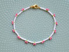 Dainty cherry beaded bracelet, made with 2mm small seed beads. Perfect as a small gift for a loved one.  If you would like the bracelet in a different color, please write me a message, I am happy to make a custom one for you. Each jewelry item comes in a colorful envelope, as seen in the last picture, and is ready to be gifted. You can find the matching necklace here https://www.etsy.com/GirassolBeads/listing/1359959725/ The same bracelet with red cherries https://www.etsy.com/GirassolBeads/list Gift Anklets With Tiny Beads, Trendy Round Bead Anklets For Gift, Dainty Colorful Beads Anklets As A Gift, Dainty Anklets With Colorful Beads As Gift, Dainty Colorful Beaded Anklets As Gift, Trendy Colorful Beaded Anklets As Gift, Summer Gift Beaded Bracelets With Beaded Chain, Summer Friendship Bracelets With Heart Beads As Gift, Summer Friendship Bracelets With Tiny Beads As Gifts